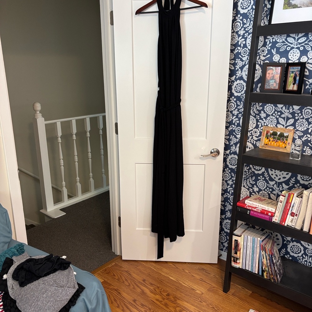 Halter top jumpsuit, backless with wide legs.